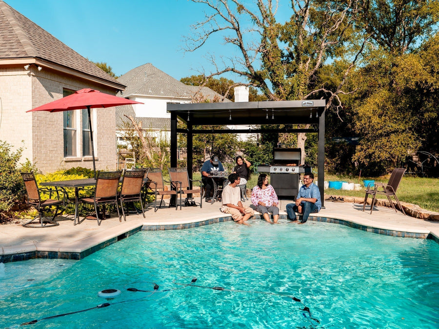 Aluminum pergola beside a backyard swimming pool