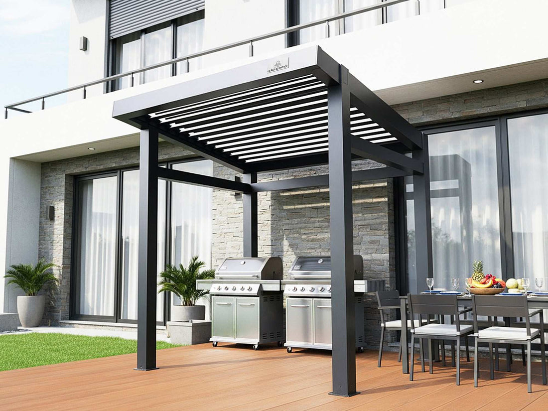 Grill Louvered Pergola Lite with adjustable louvered roof, two grills, and an outdoor dining set.