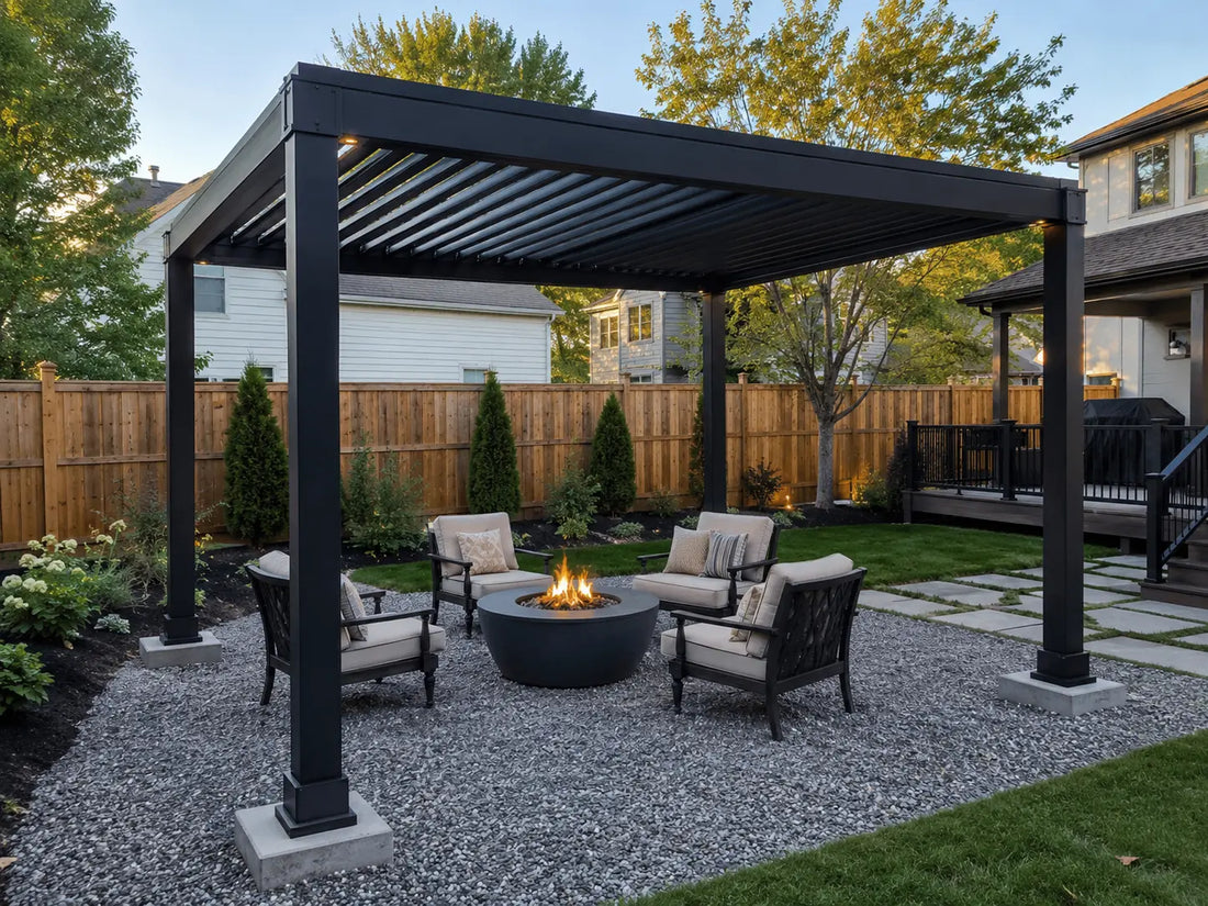 Pergola installed over a gravel area with concrete footings supporting each post in a backyard seating space.